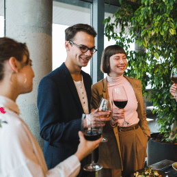 People with wineglasses partying