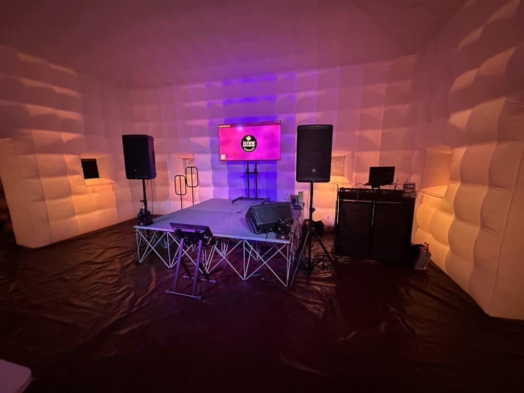 interior with screen, sound system, and stage